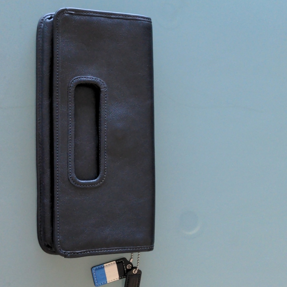 New Coach black leather clutch